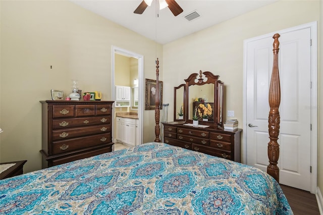 bedroom with ensuite bath, ceiling fan, and hardwood / wood-style flooring