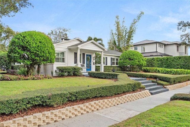 view of front of property with a front yard