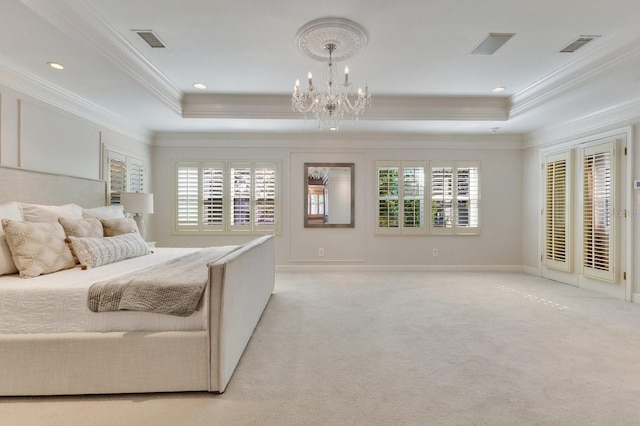 bedroom with light colored carpet, ornamental molding, a raised ceiling, and a chandelier