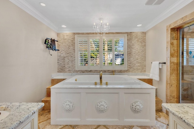 bathroom featuring vanity, a bathtub, a chandelier, and ornamental molding