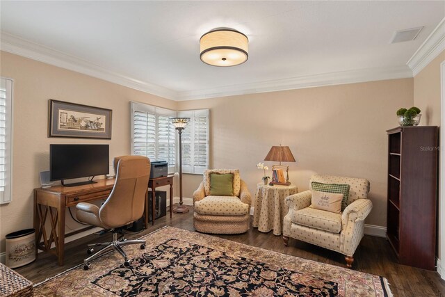 office with dark wood-type flooring and crown molding