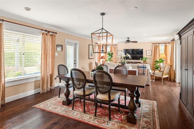 dining area featuring a chandelier, dark hardwood / wood-style flooring, and ornamental molding