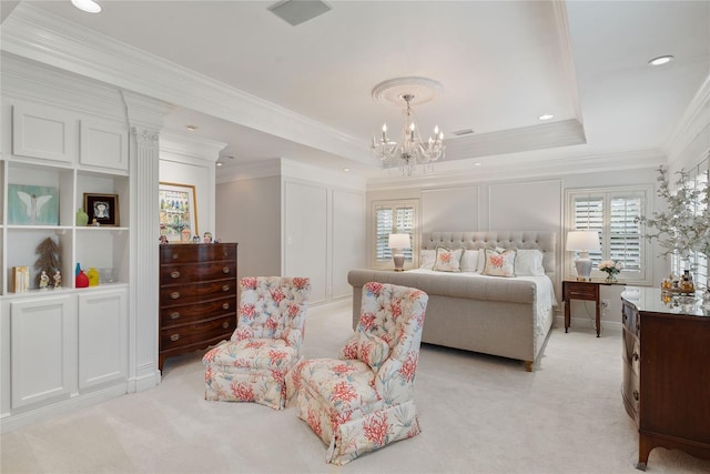 carpeted bedroom with a raised ceiling, a notable chandelier, and ornamental molding