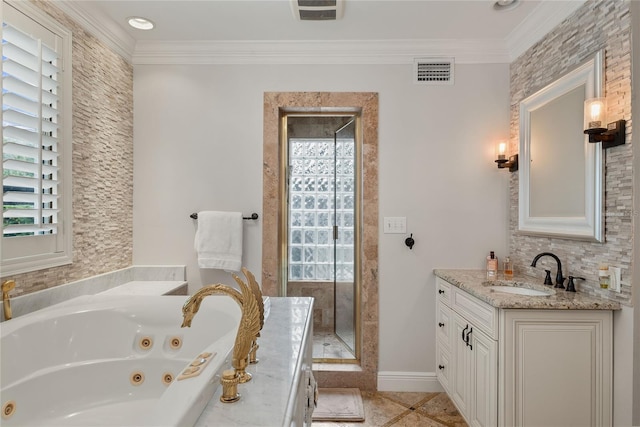 bathroom with a bath, tile patterned flooring, crown molding, and vanity