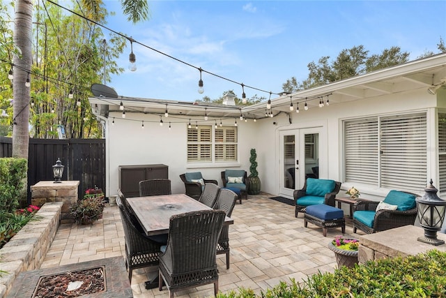 view of patio featuring an outdoor living space and french doors