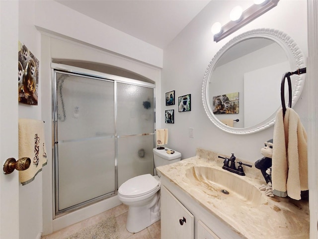 bathroom with vanity, toilet, and walk in shower