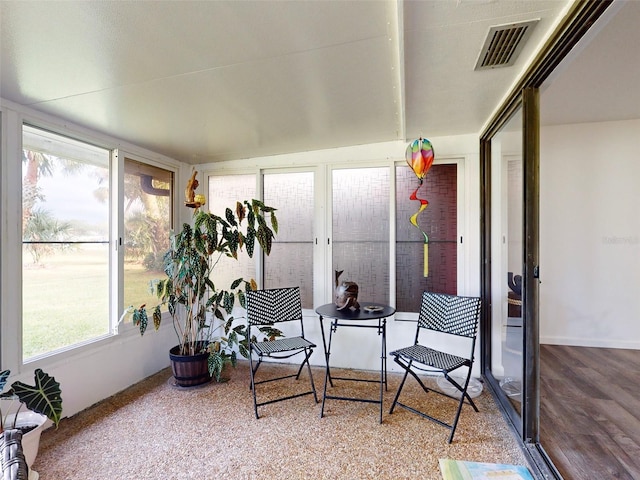 sunroom featuring plenty of natural light