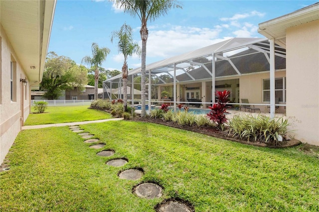 view of yard featuring a lanai