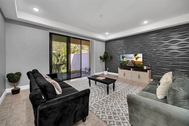 living room with tile patterned flooring