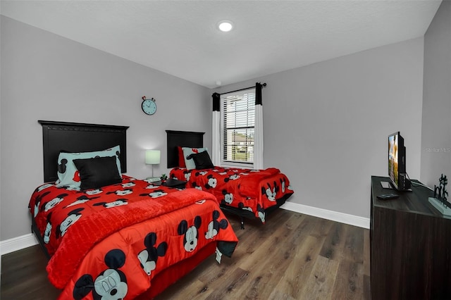 8169 Roseville Rd, Davenport, FL 33896 - bedroom with wood finished floors and recessed lighting