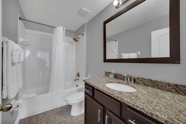 8169 Roseville Rd, Davenport, FL 33896 - full bath with shower / tub combo, vanity, tile patterned floors, and a textured ceiling