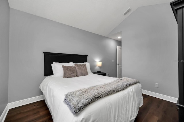 8169 Roseville Rd, Davenport, FL 33896 - bedroom featuring lofted ceiling and wood finished floors