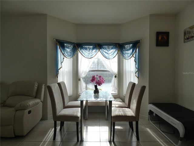 dining room with light tile patterned floors