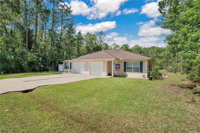 ranch-style home featuring a front lawn and a garage