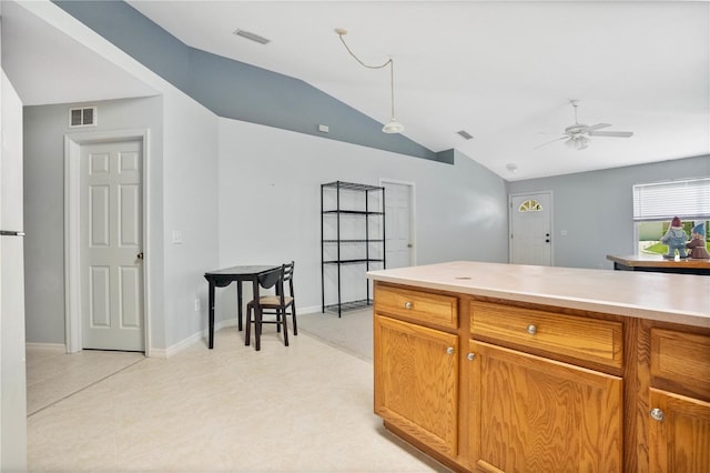 kitchen featuring vaulted ceiling and ceiling fan