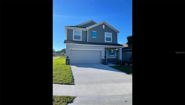 view of front of home with a garage, driveway, stone siding, and a front lawn