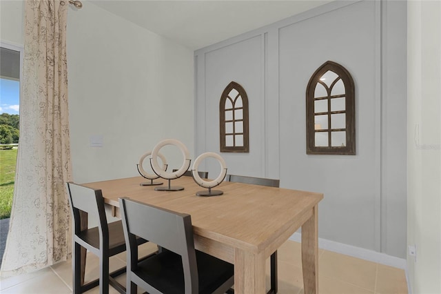 dining room with light tile patterned floors