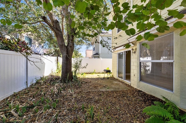 view of yard with a fenced backyard