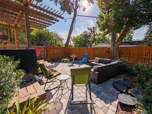 view of patio / terrace featuring an outdoor living space and a pergola