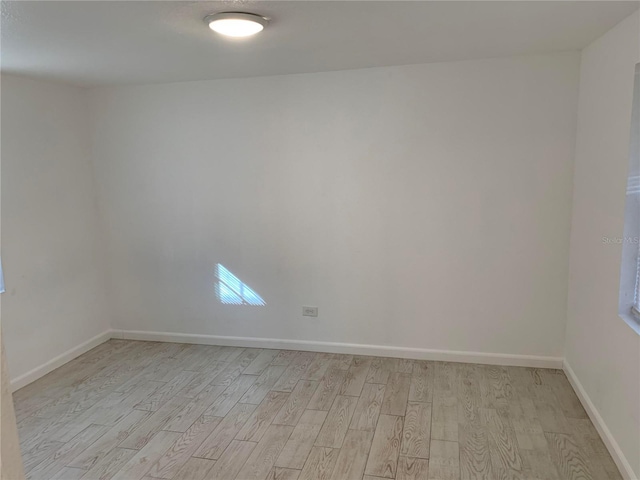 empty room featuring light hardwood / wood-style floors