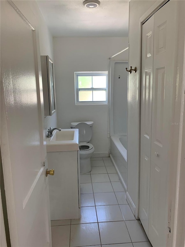 full bathroom with tile patterned flooring, vanity, toilet, and shower / tub combination