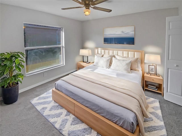 bedroom with dark carpet and ceiling fan