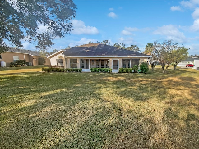 ranch-style house with a front lawn