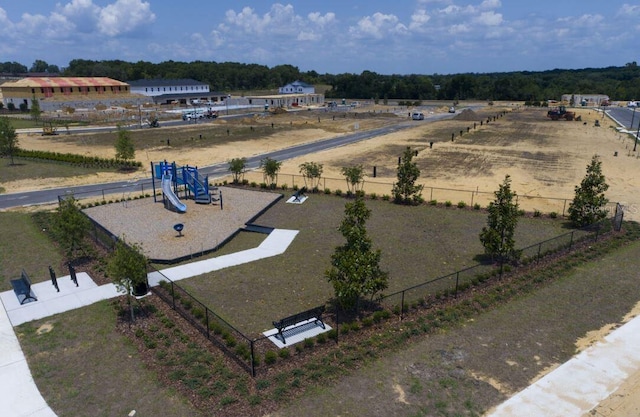 birds eye view of property with a rural view