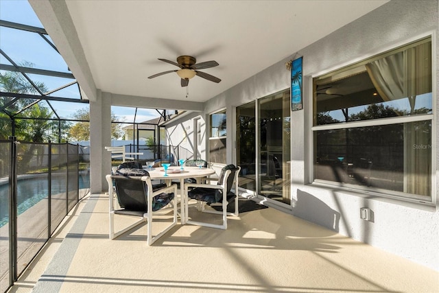 sunroom / solarium with ceiling fan