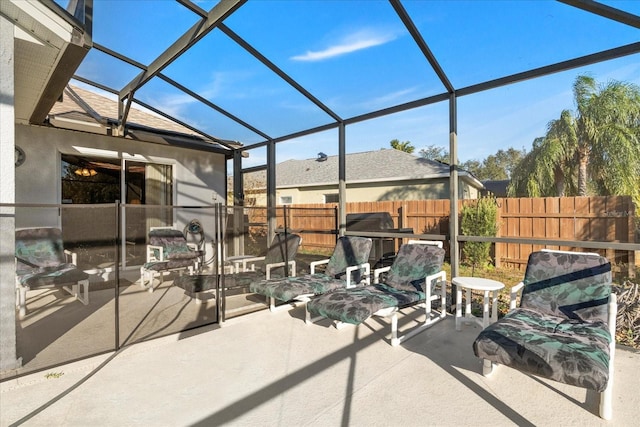 view of patio / terrace with glass enclosure