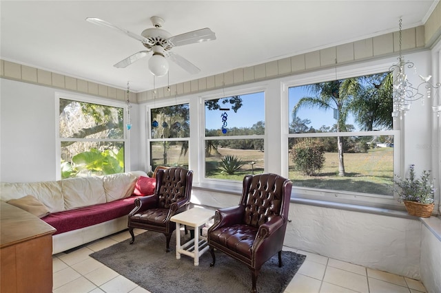 sunroom with ceiling fan