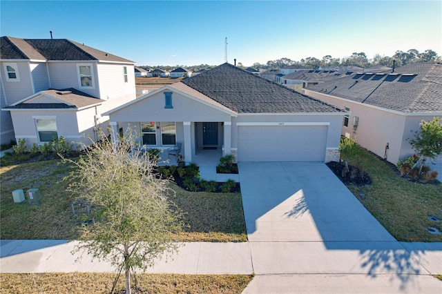 view of front of property with a garage