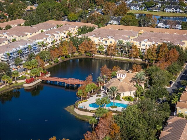 birds eye view of property with a water view