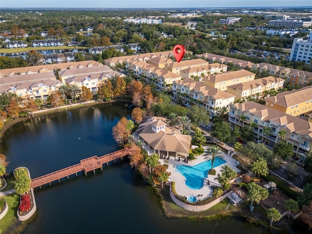 birds eye view of property featuring a water view