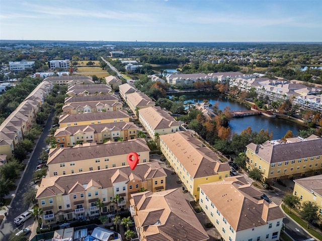 drone / aerial view with a water view