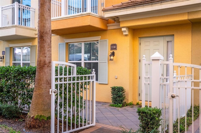 property entrance with a balcony