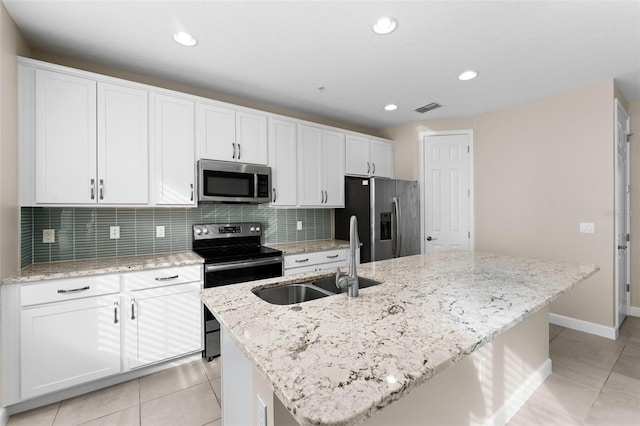 kitchen with sink, a center island with sink, white cabinets, and appliances with stainless steel finishes