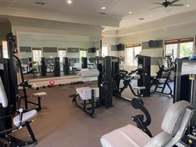 exercise room featuring ceiling fan