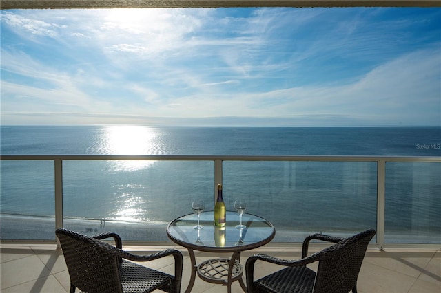 balcony featuring a water view