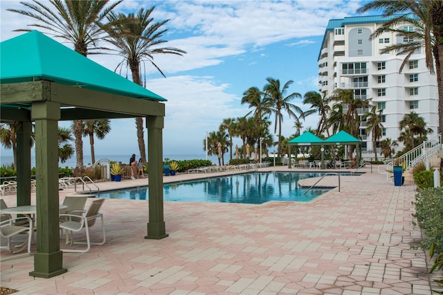 view of pool with a gazebo and a patio area