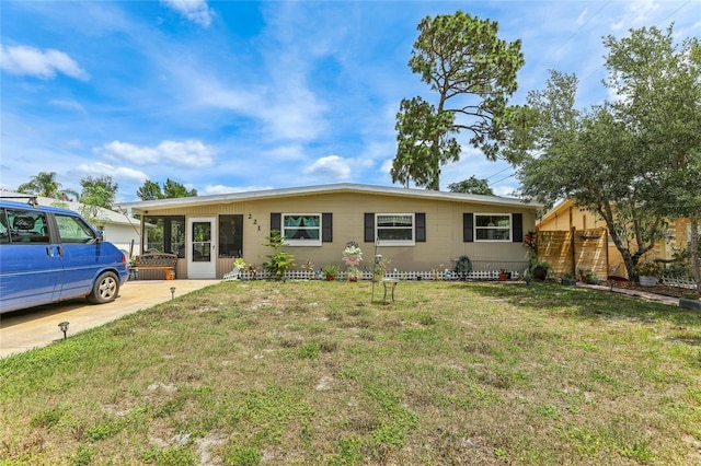 ranch-style house with a front yard