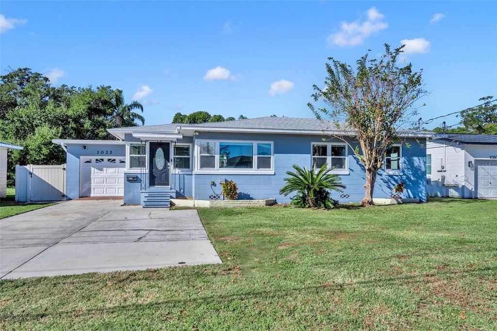 ranch-style home with a front yard