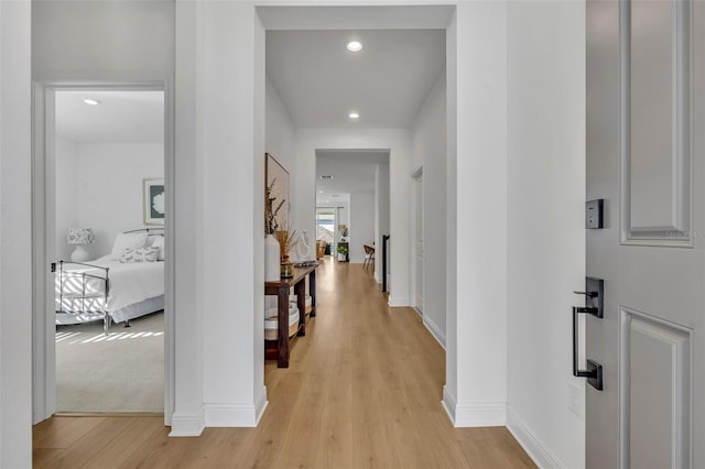 hallway with light wood-type flooring