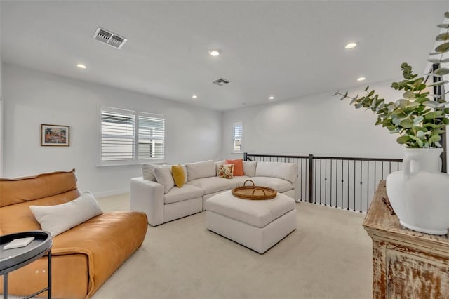 living room featuring light colored carpet