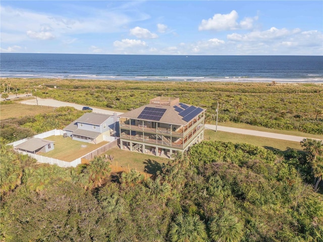 aerial view with a view of the beach and a water view