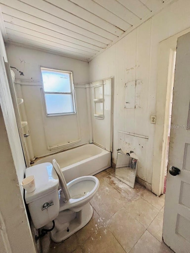 bathroom with tile patterned floors, shower / washtub combination, wood ceiling, and toilet