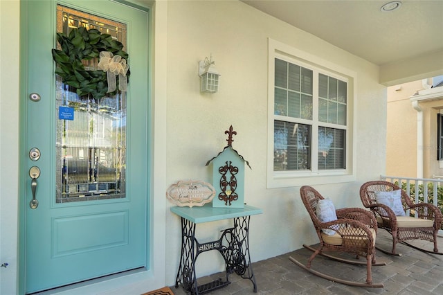 entrance to property with covered porch