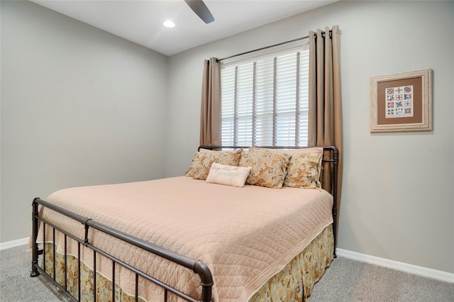 bedroom with light carpet and ceiling fan