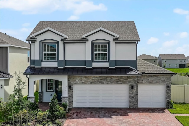 view of front of property with a garage