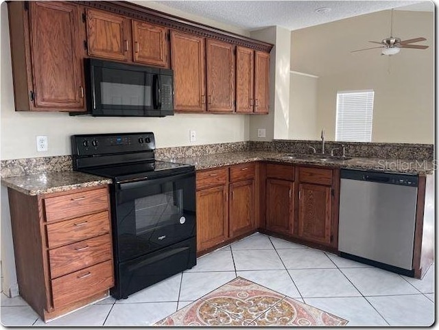 kitchen with ceiling fan, sink, a textured ceiling, light tile patterned floors, and black appliances